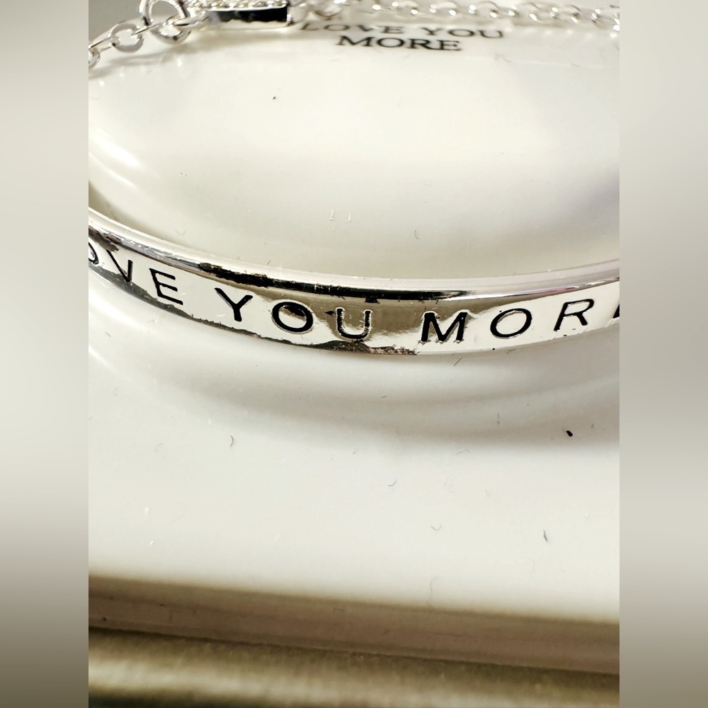 NWT silver plated bracelet w/attached charm, coach charm, & leather purse charm - Picture 5 of 16
